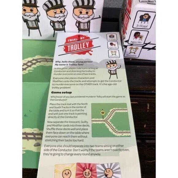 Trial by Trolley by Cyanide & Happiness Party Board Game with Modifier Pack - Picture 3 of 12